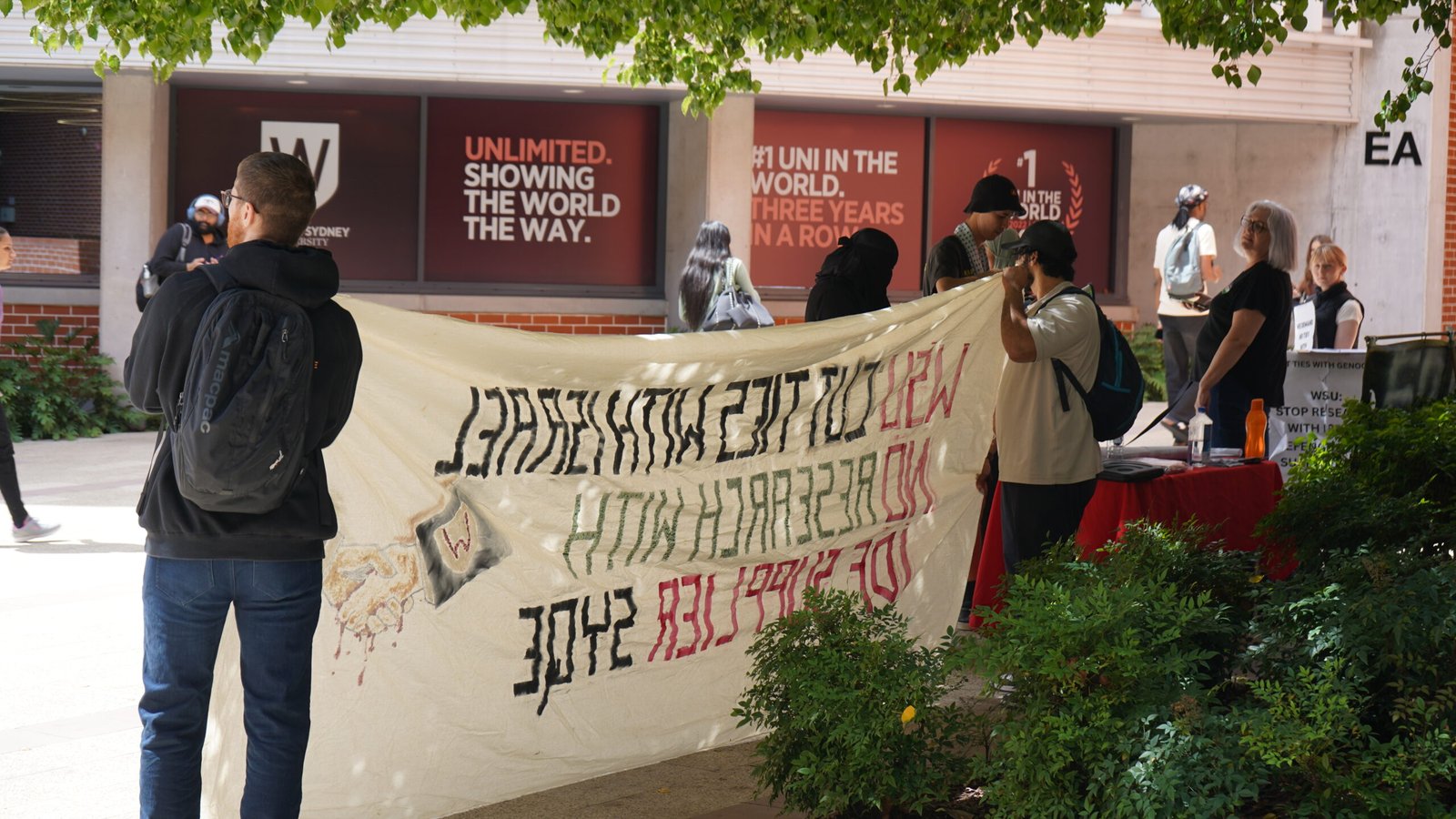 (Protesters at Western. Image by Eleanor Cooper, 2025)